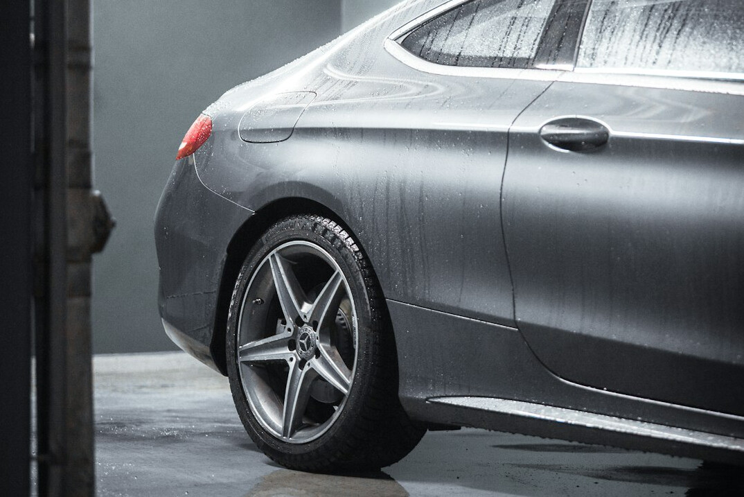 Car parked with clean silver alloy wheels