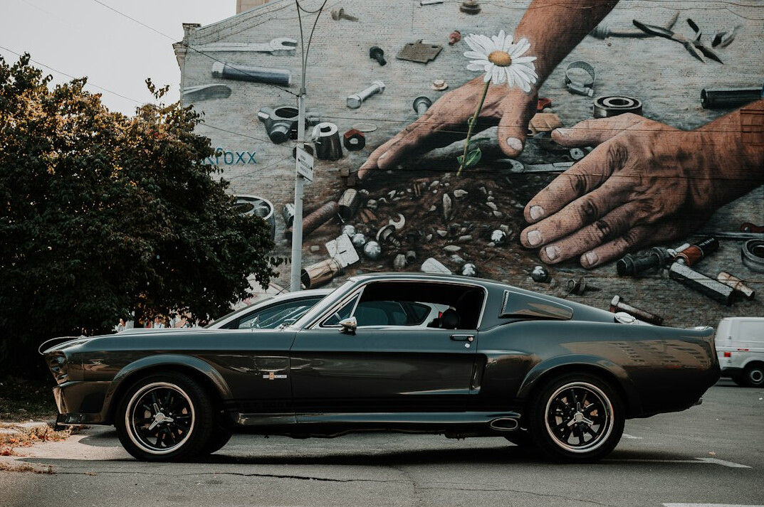 Muscle car with shiny alloy wheels