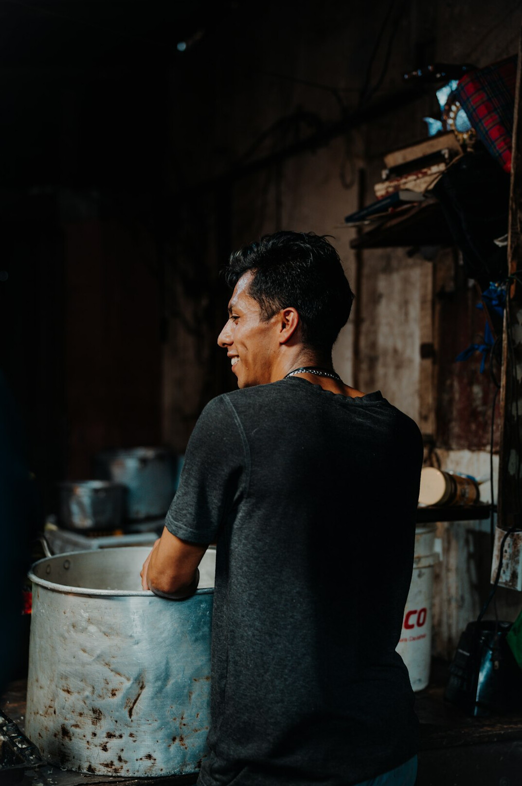 Portrait of a smiling craftsman in a workshop